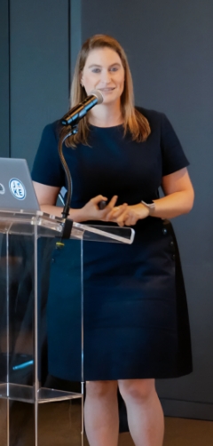 PS Employee at speaking event